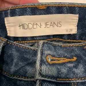 Denim jeans with ankle fraying